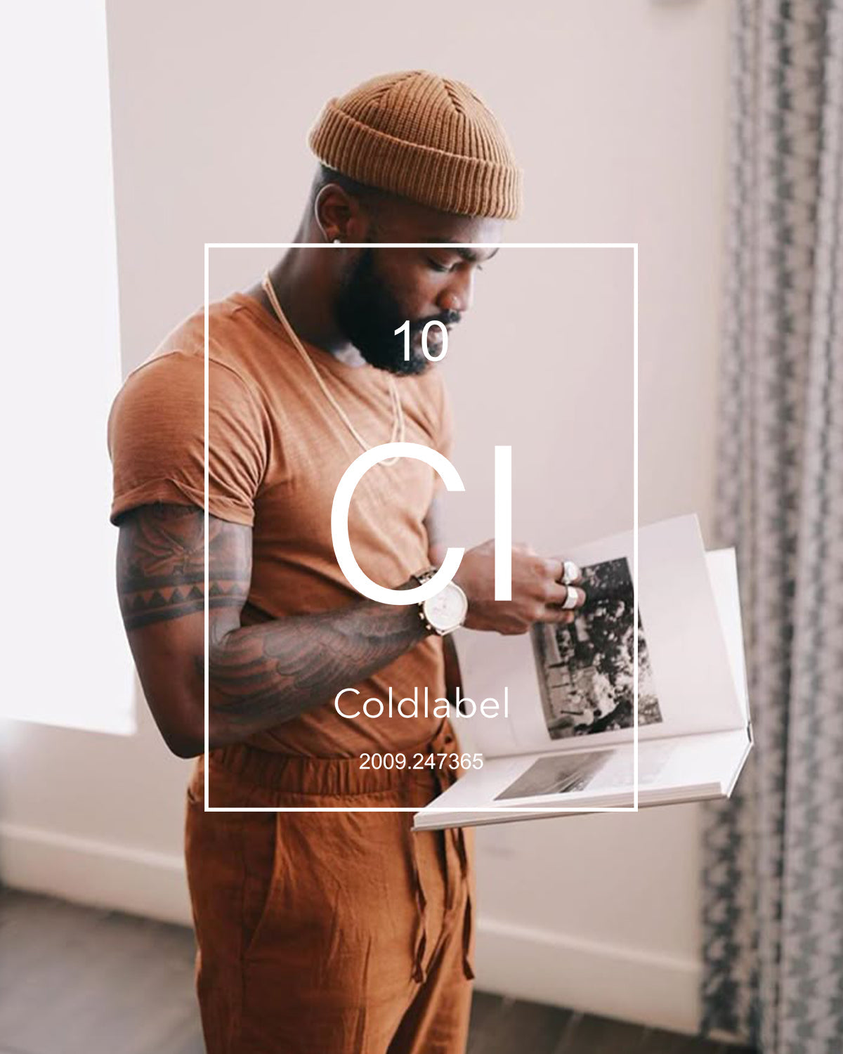 Man in orange with beanie